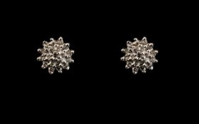 Ladies Attractive 9ct White Gold Pair of Diamond Set Cluster Earrings - Flower head Design. Marked