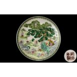 Large Chinese Charger with vibrant green decoration; character marks to underside, 16.75 inches (