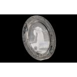 A Waterford Crystal Mounded Photo Frame of oval form decorated with frosted flowers. Velvet back