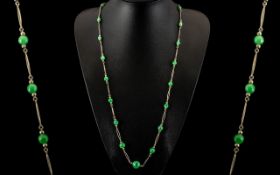 Early 19th Century Malachite and Silver Necklace, the malachite beads in pebble form, strung with