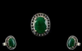 925 Sterling Silver 8.14 Ct Emerald Ring with 1.2 Ct Blue Sapphires.
