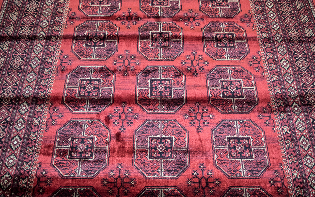 A Genuine Cashmere Red Ground Carpet/Rug. Bukhara design.As new condition. Measures 2.40 by 1.60 - Image 2 of 2