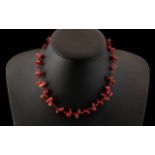 Early 20th Century Red Coral Necklace of Pebble and Natural Form. 16 Inches In length. Please See