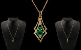 Ladies - 9ct Gold Attractive Art Deco Style Emerald and Diamond Set Shaped Pendant Drop, with