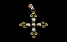 Large Silver Pearl and Peridot Cross, a statement piece set with twelve lively peridots and five