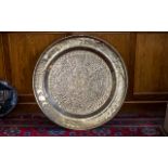 Large Antque Oriental Embossed Brass Dish with a floral design, 36 inches (90cms) in diameter