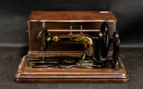 Singer Sewing Machine, housed in a mahogany box