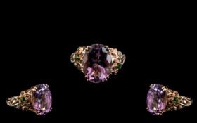 Rose de France Amethyst and Side Gem Statement Ring, an 11.5ct oval cut amethyst of the beautiful