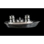 Art Deco Chromed Salt and Pepper Set in the form of a boat, 8 inches (20cms) in diameter