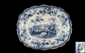 Staffordshire Pottery Transfer Printed Blue and White Meat Plate, with a Shaped Edge, Depicting a