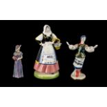 Porcelain Figure of a Russian Dancing Girl, 6 inches (15cms) high, an Italian lady flower seller,