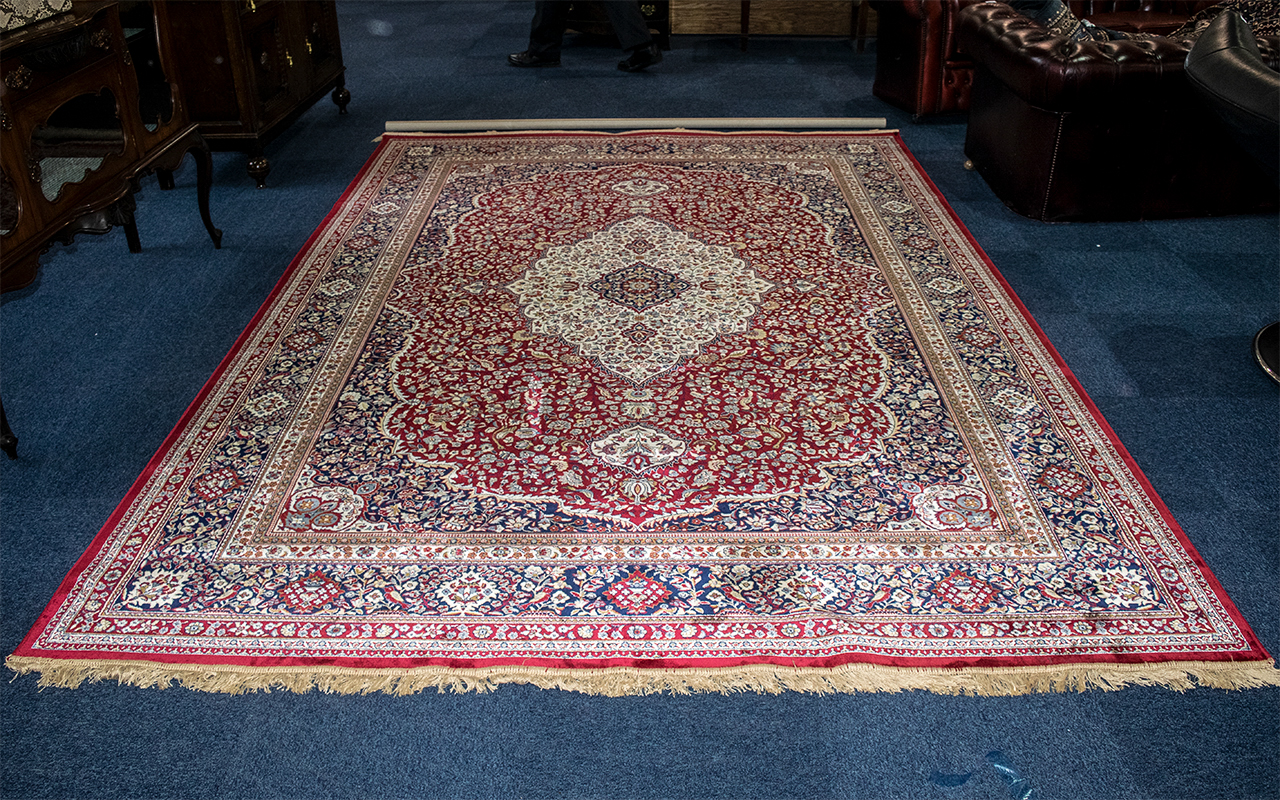 A Genuine Cashmere Large Red Ground Marrakech Carpet/Rug. As new condition. Measures 2.40 by 3.30