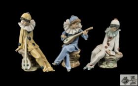 Nao by Lladro Trio ( 3 ) of Hand Painted Porcelain Figures ' Harlequins ' Boys.