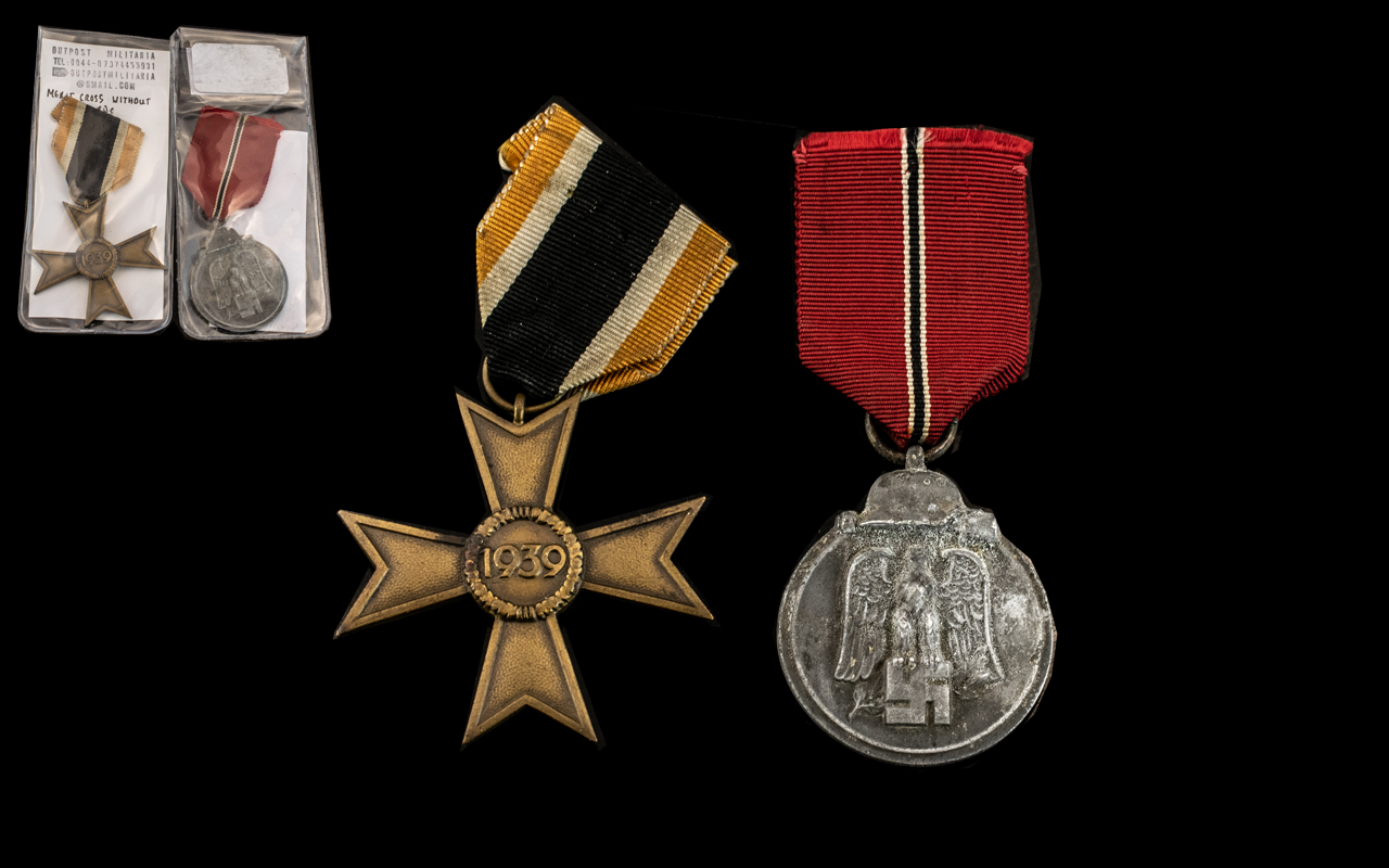 Two German WWll Medals, one Merit Cross and one Winter Campaign Medal (2)