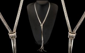 A Retro Designer Silver Necklace, of textured link, with central buckle, 18" total with a 8.