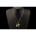 Two Silver Necklaces with green stones, a cross decorated with six green stones, and a drop