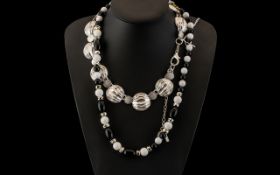 Saks of London Silver Tone Necklace No. SKN1943, shell like ripple effect large discs with small
