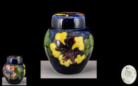Moorcroft - Tubelined Ginger Jar of Small Proportions ' Hibiscus ' Assorted Coloured Design on Blue