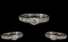 18ct White Gold - Nice Quality Diamond Set Ring. The Central Round Brilliant Cut Diamond of