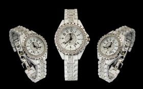 Ladies White Ceramic Stone Set Quartz Fashon Wrist Watch. Serial No Z.G.58096.