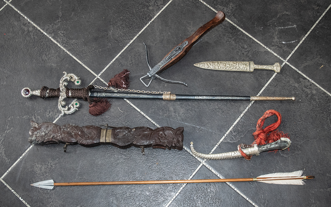 Collection of Decorative Weaponry comprising daggers, swords, crossbow, arrows etc.