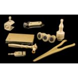 Collection of Antique Ivory to include glove stretchers, whistle, lace bobbins, card holder purse,