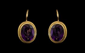 Ladies Pair of Fine Quality 18ct Gold Pair of Alexandrite Set Stone Earrings. Marked 18ct.