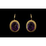 Ladies Pair of Fine Quality 18ct Gold Pair of Alexandrite Set Stone Earrings. Marked 18ct.
