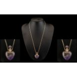 Sage Amethyst Perfume Bottle Pendant, a heart shaped perfume bottle cut from purple amethyst,