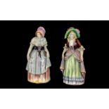 Pair of 1930's Porcelain Figures of Girls Wearing Traditional Ware, Brightly Decorated.