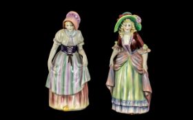 Pair of 1930's Porcelain Figures of Girls Wearing Traditional Ware, Brightly Decorated.