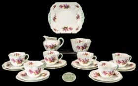 Shelley 'Blossom' Pattern Bone China Tea Set, comprising six trios of cups with fluted edges,