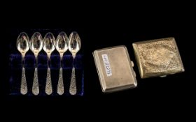 A Set of Five Silver Teaspoons in fitted case,