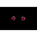 Ruby Stud Earrings, each a round cut solitaire ruby of good colour,