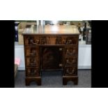 A Modern Mahogany Kneehole Desk,