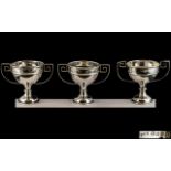 Three Silver George V Twin Handled Trophies. Hallmarked for London 18365, Gross weight 7 onz.
