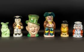 Collection of Six Toby Jugs, comprising: Beswick 'Title Deeds' marked 310 to base 9'' tall; Tony