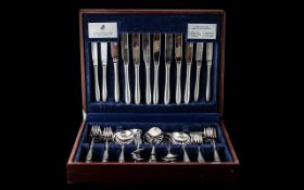Canteen of Cutlery by Viners, housed in wooden box, made of stainless steel,