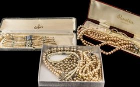 Three Boxes Containing Vintage Costume Jewellery comprising Triple strand champagne pearl necklace