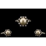 Ladies 14ct White Gold Stylish and Attractive Diamond and Pearl Set Dress Ring.