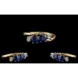 18ct Yellow and White Gold Diamond and Blue Sapphire Set Dress Ring - From the 1960's. Marked 18ct