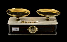 A Set of French Porter / Counter Scales Marble top with brass hands and associated weights.