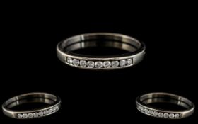 Ladies - Contemporary 9ct White Gold Channel Set Nine Stone Diamond Ring. Full Hallmark for 9.375.