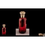 Late Victorian Period Ornate Silver Topped Cranberry Coloured Glass Scent Bottle.