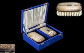 Pair of Silver Backed Clothes Brushes and Comb - Boxed.