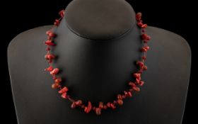 Early 20th Century Red Coral Necklace of Pebble and Natural Form. 16 Inches In length. Please See