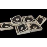 Collection of Wedgwood Black Jasper comprising four assorted sweet dishes, and two ashtrays.