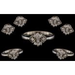 A Contemporary and Attractive Platinum - Diamond Set Jewellery Suite ( 3 ) Comprises of Dress Ring