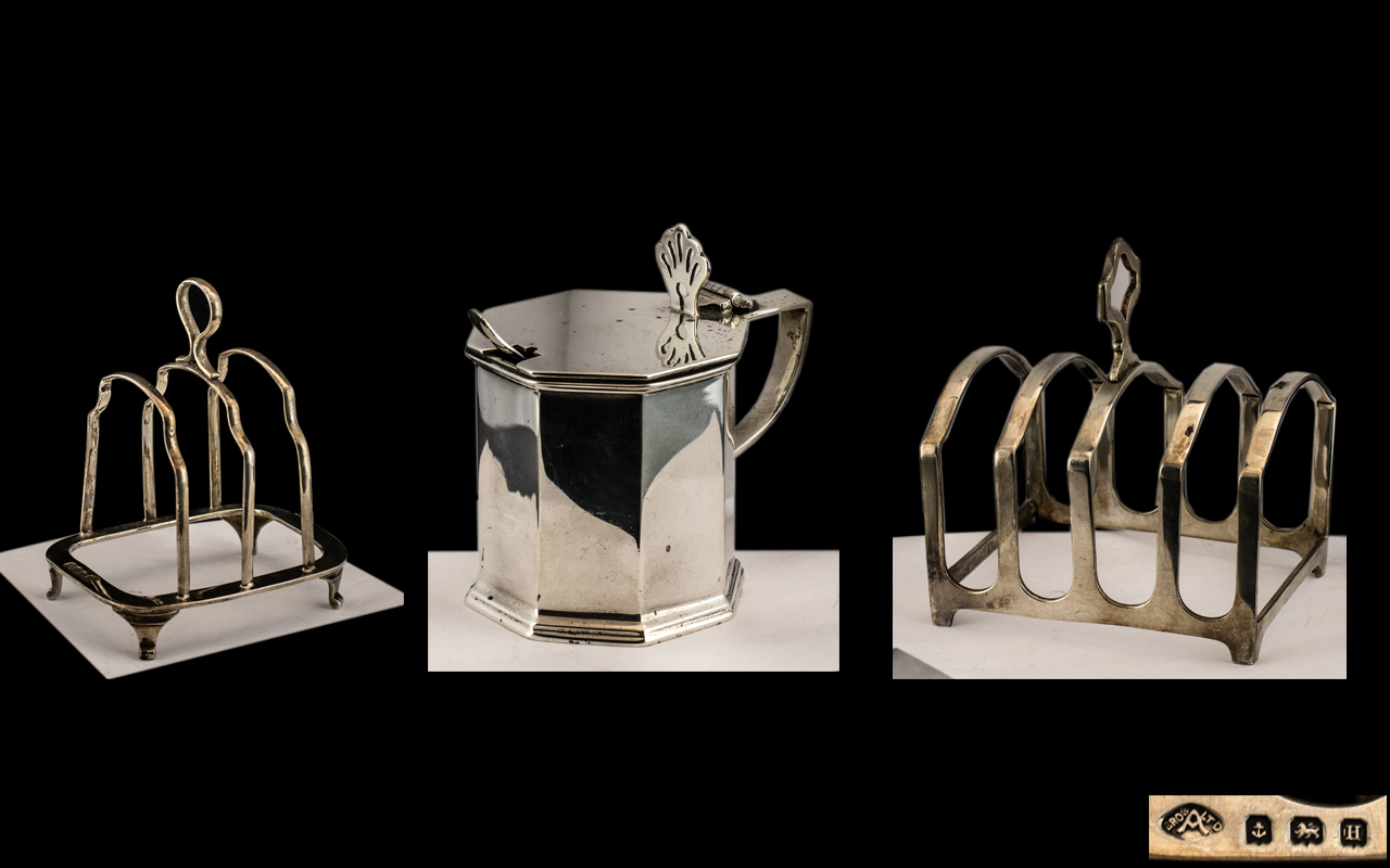 A Collection of Silver to include two toast racks,