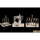 A Collection of Silver to include two toast racks,
